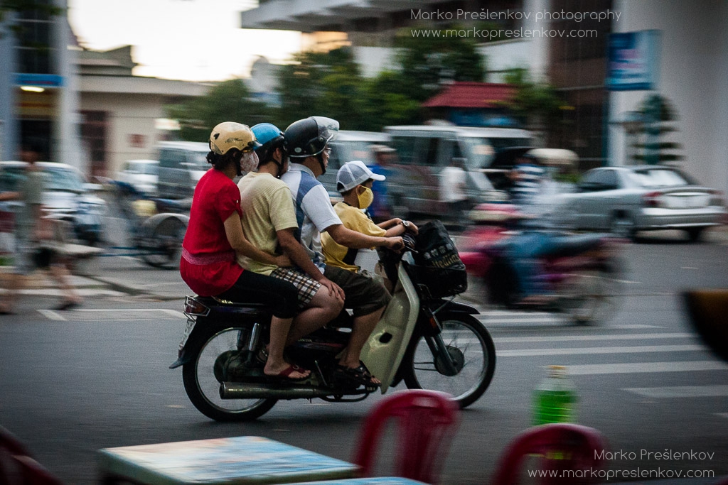 Family of four on moped