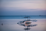 Moored and stuck in the sand during low tide