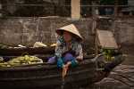 Seller washing her hands