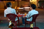 Two friends enjoying the meal