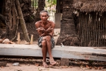 Lao elder enjoying his moment smoking