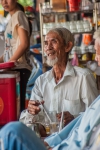 Elder man enjoying afternoon jasmine tea