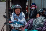 Biker on the baking hot ferry