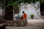 Buddhist monks toying with mobile phones