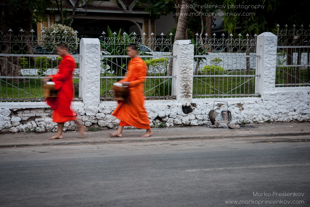 Two monks during alms procession