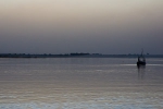 Pinasse in an evening mist