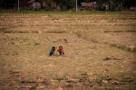Lao girls playing in the field