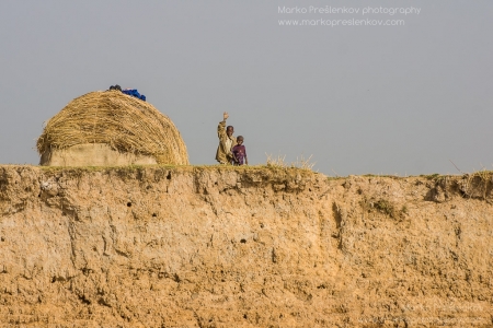 Two boys on the shore