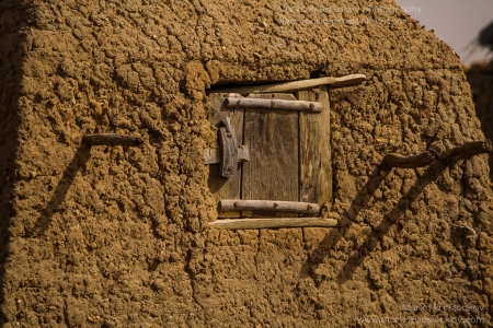 Wooden window shutter in Anakanda village